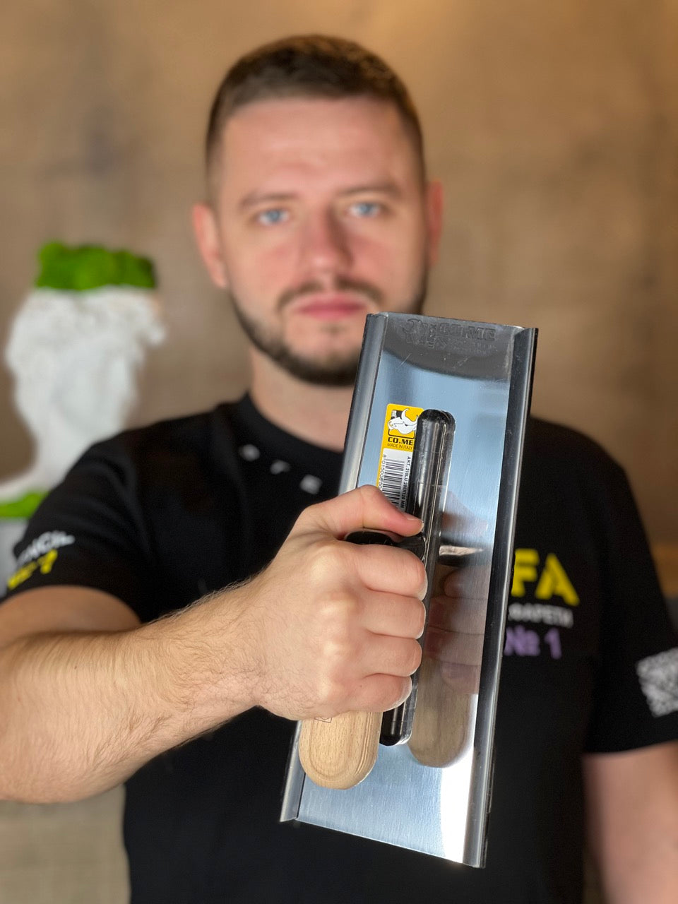 spatula with a wooden handle. Trapezoidal shape 280x120 mm