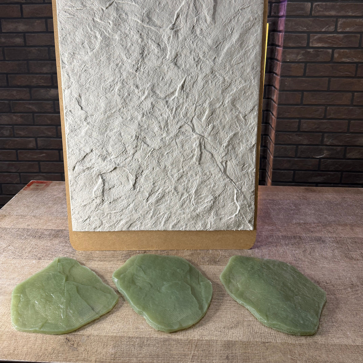 Stone texture silicone stamp set with three reusable plaster stamps and handles in different natural rock relief patterns