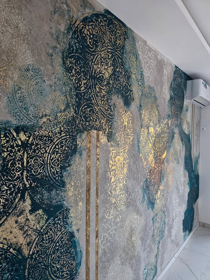 Reusable mandala wall stencil creating plaster pattern on textured wall