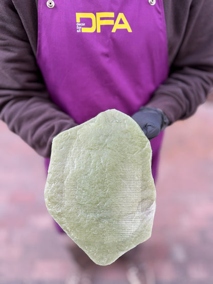 Stone Texture 1 silicone plaster stamp with handle for creating natural stone relief patterns on walls
