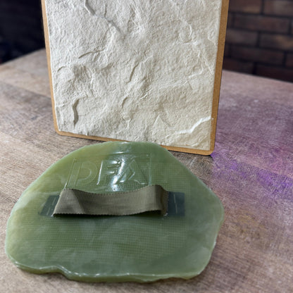Stone Texture 1 silicone plaster stamp with handle for creating natural stone relief patterns on walls