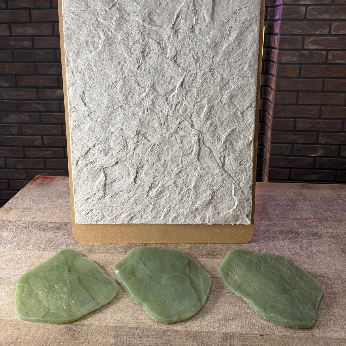 Stone texture silicone stamp set with three reusable plaster stamps and handles in different natural rock relief patterns